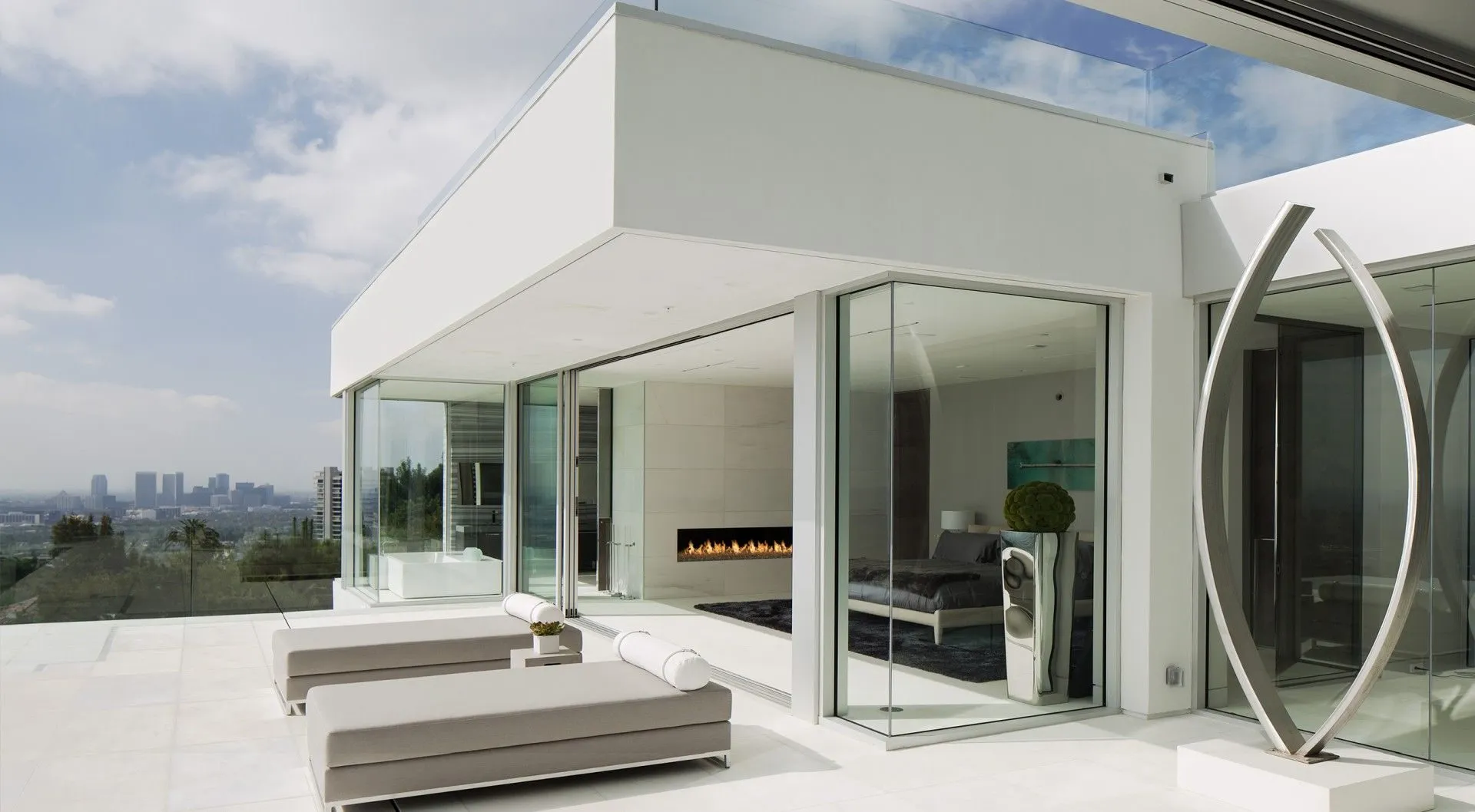 Exterior lounge terrace with a circular hanging chair