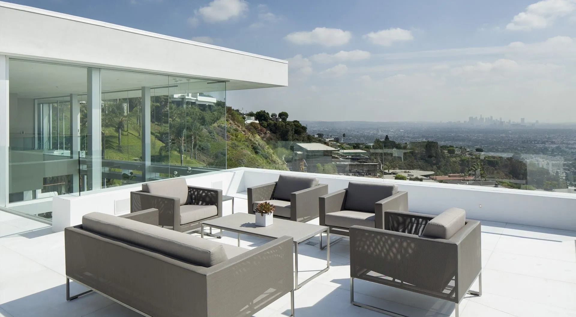 Roof terrace lounge with sweeping city views