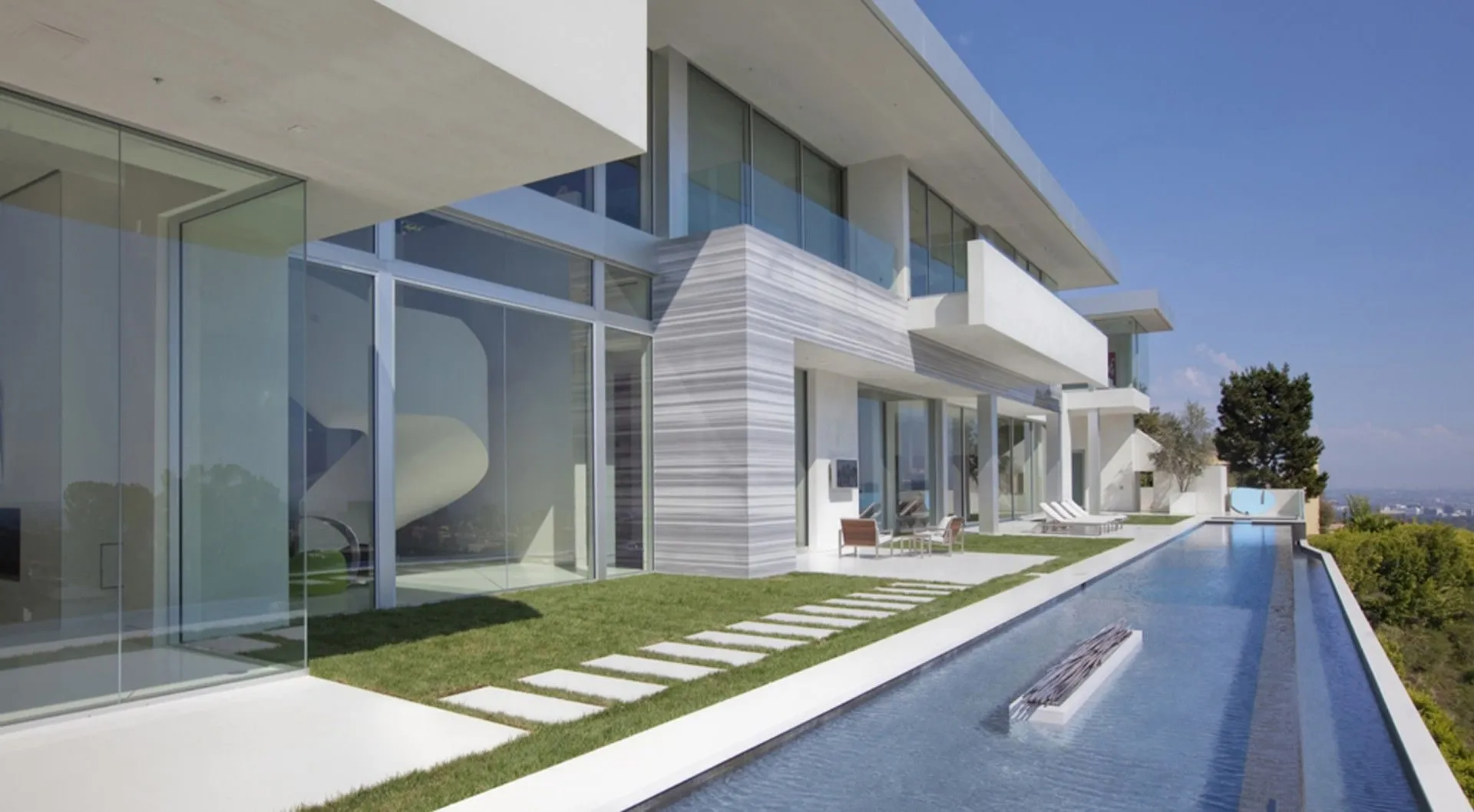 Sarbonne lap pool and terrace elevated above the city