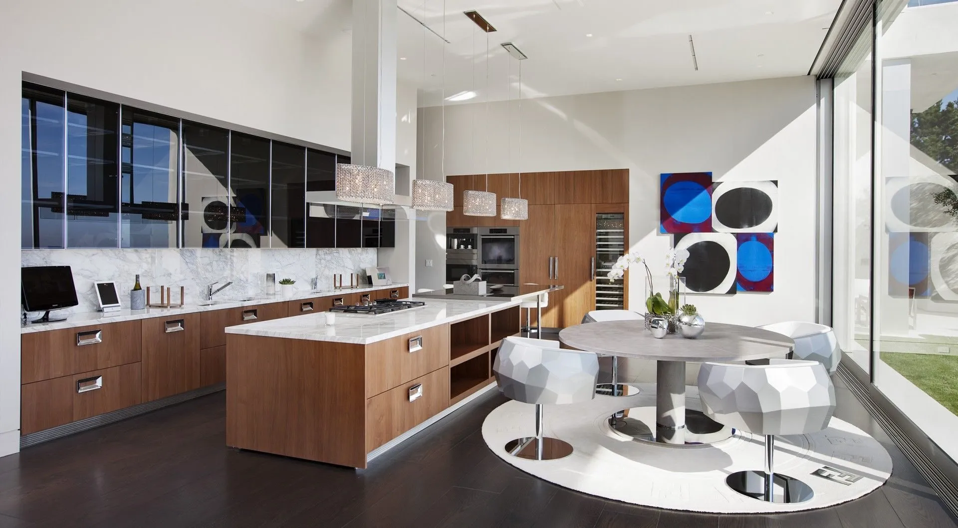 Wood and white kitchen with round breakfast table