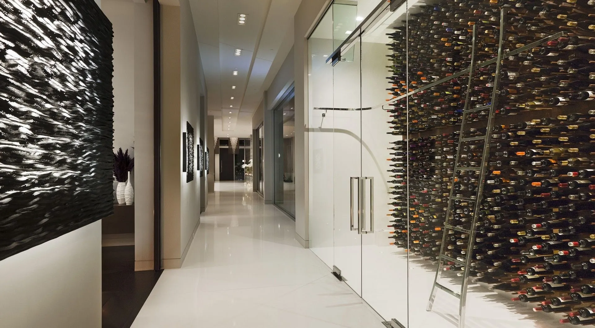 Wine storage corridor with glass bottle wall