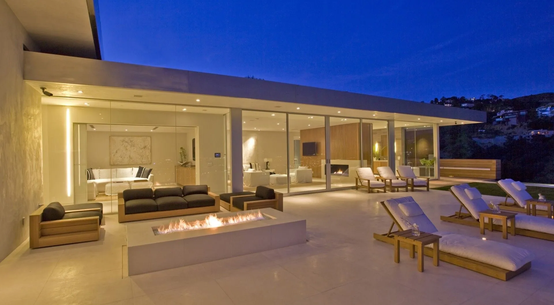 Covered terrace with fire feature and lounge seating