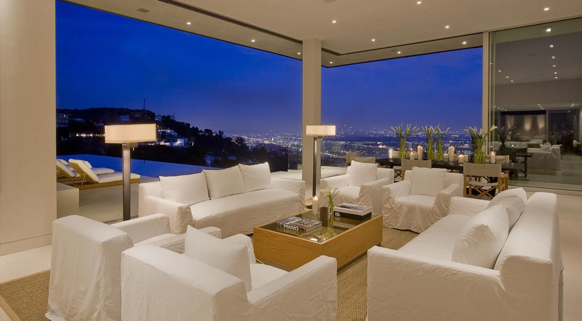 Outdoor living room overlooking Los Angeles at dusk
