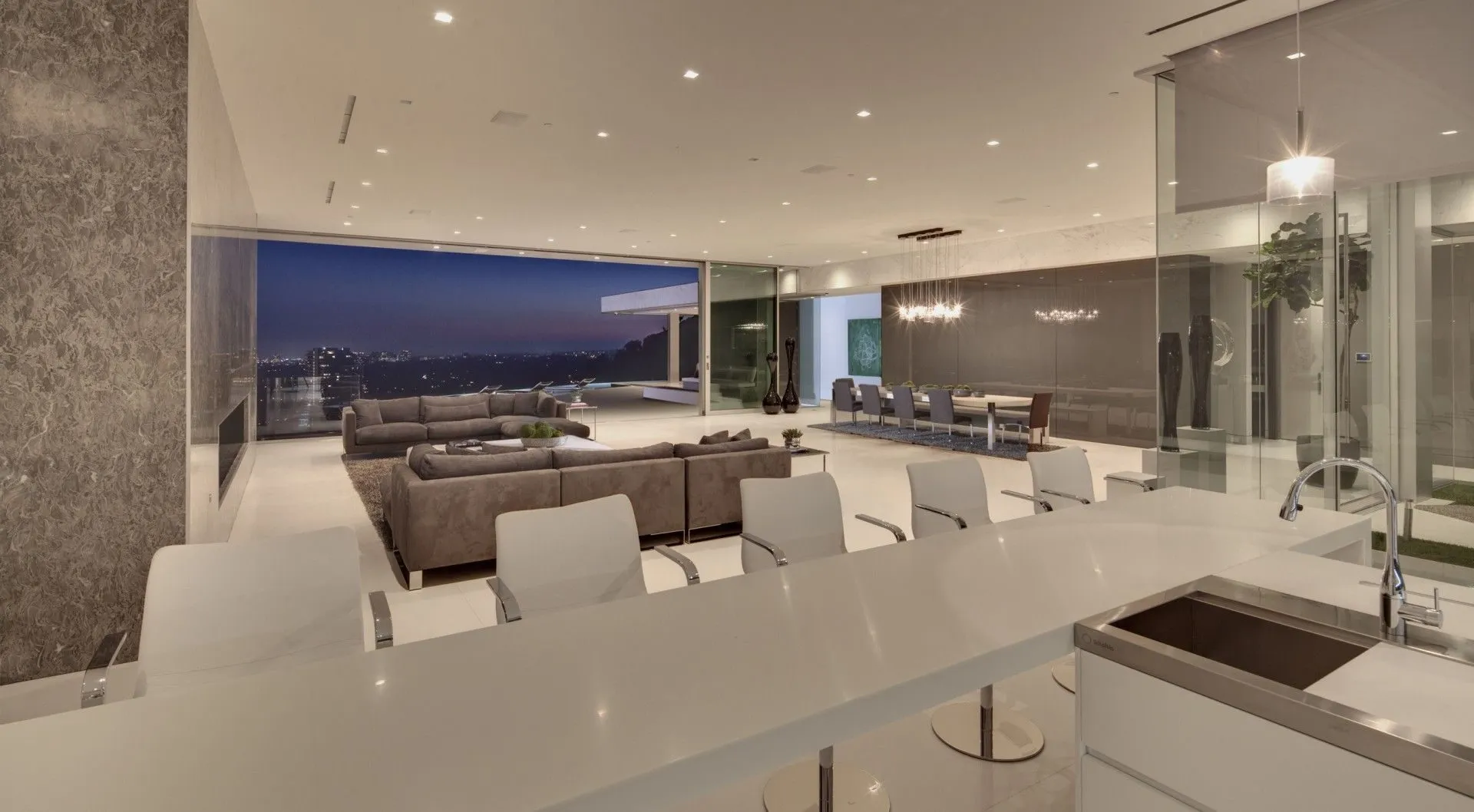 Open living area and terrace at night