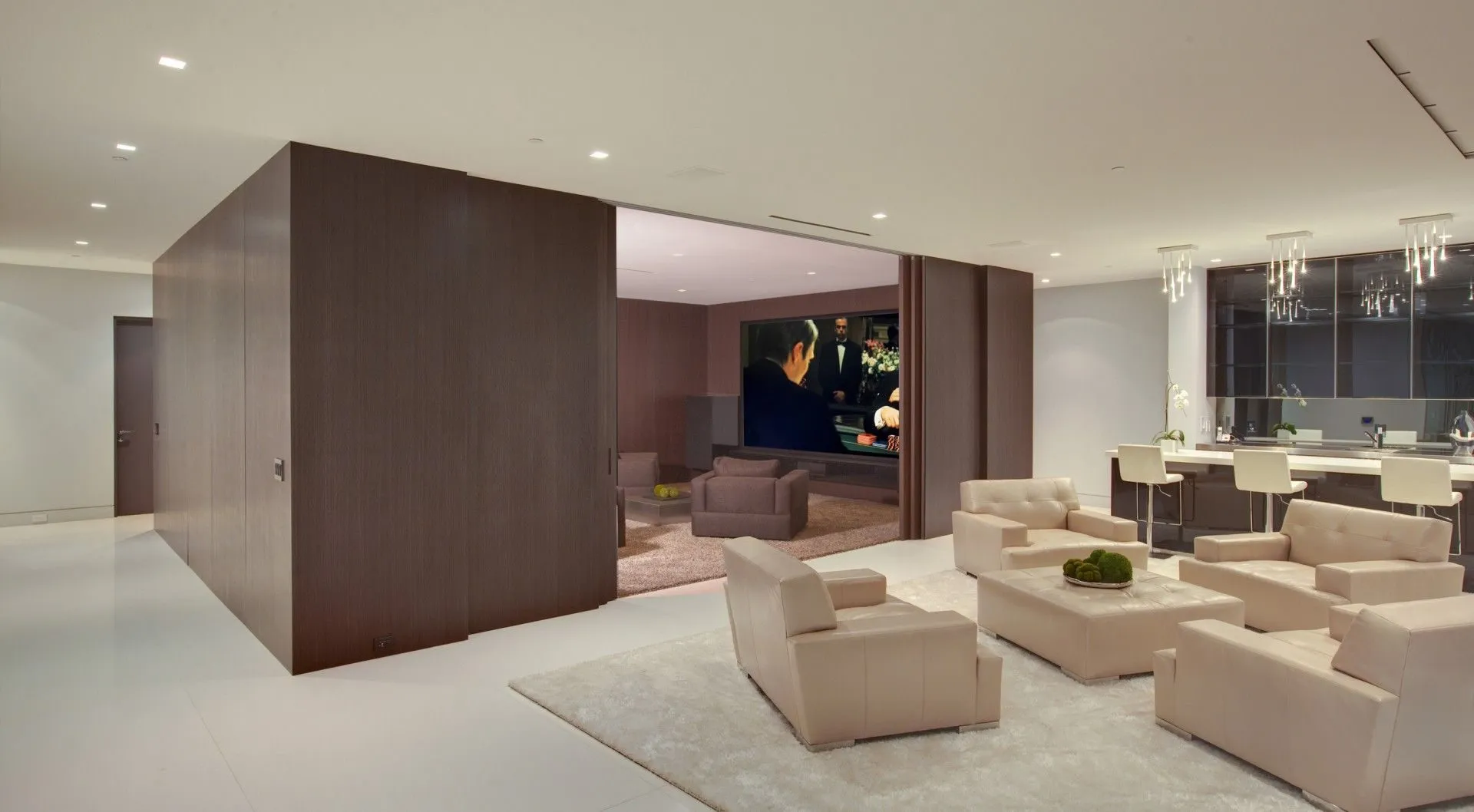 Living room with wood media volume and city view